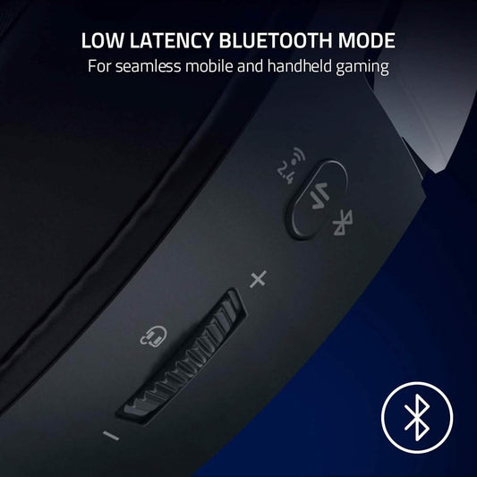 Wireless headset earcup with control buttons on dark gray housing and logo