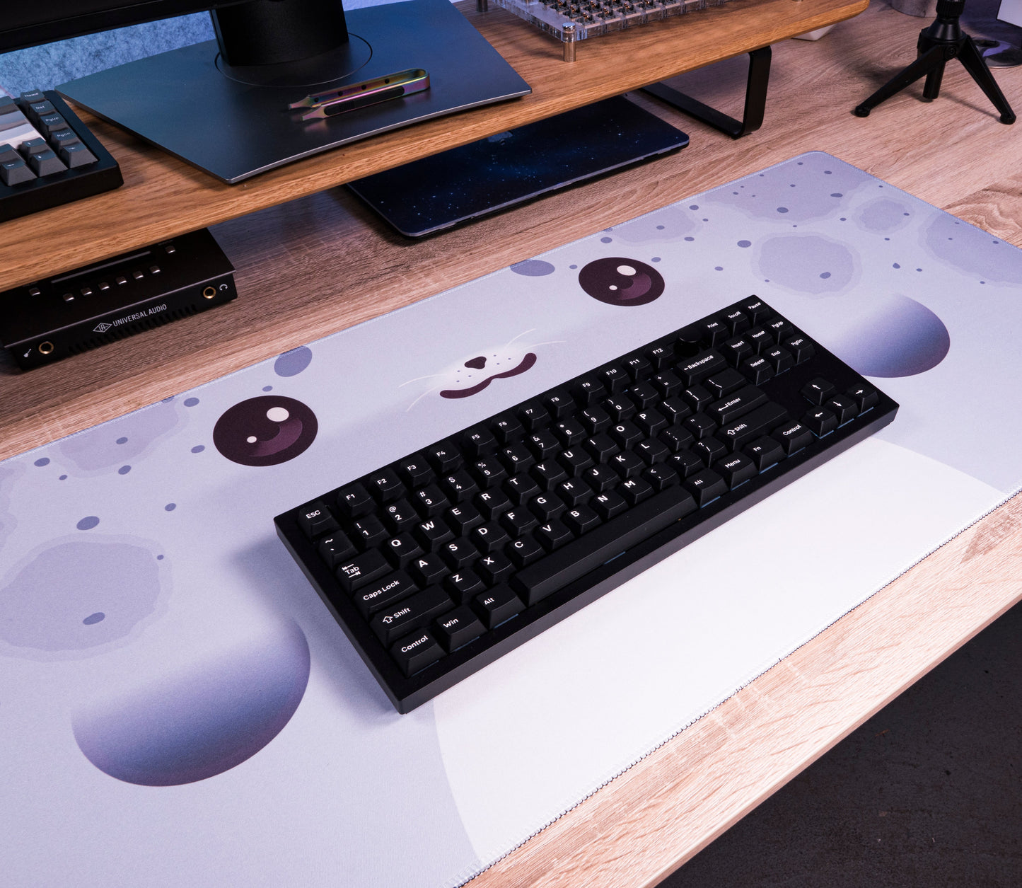 Seal-pattern desk mat with keyboard centered, light blue and white cute seal design