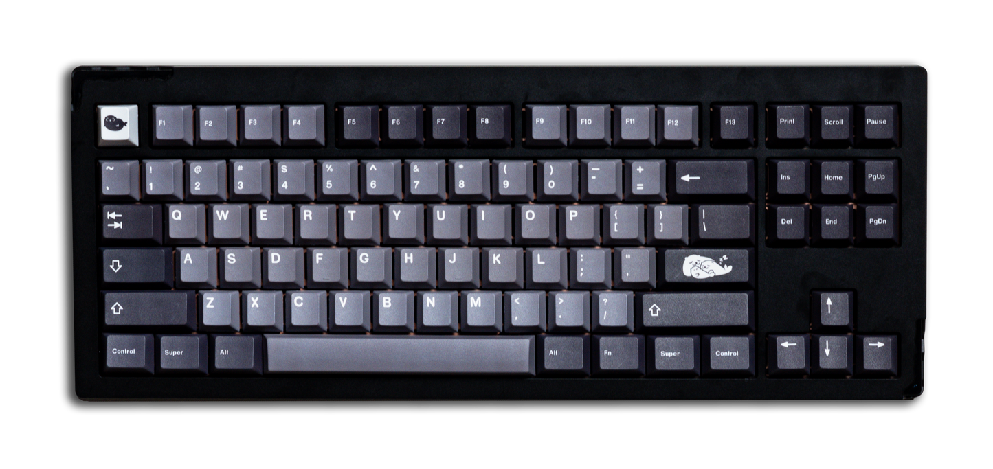 Keycap set with dark blue and light gray keys, visible QWERTY row and modifiers