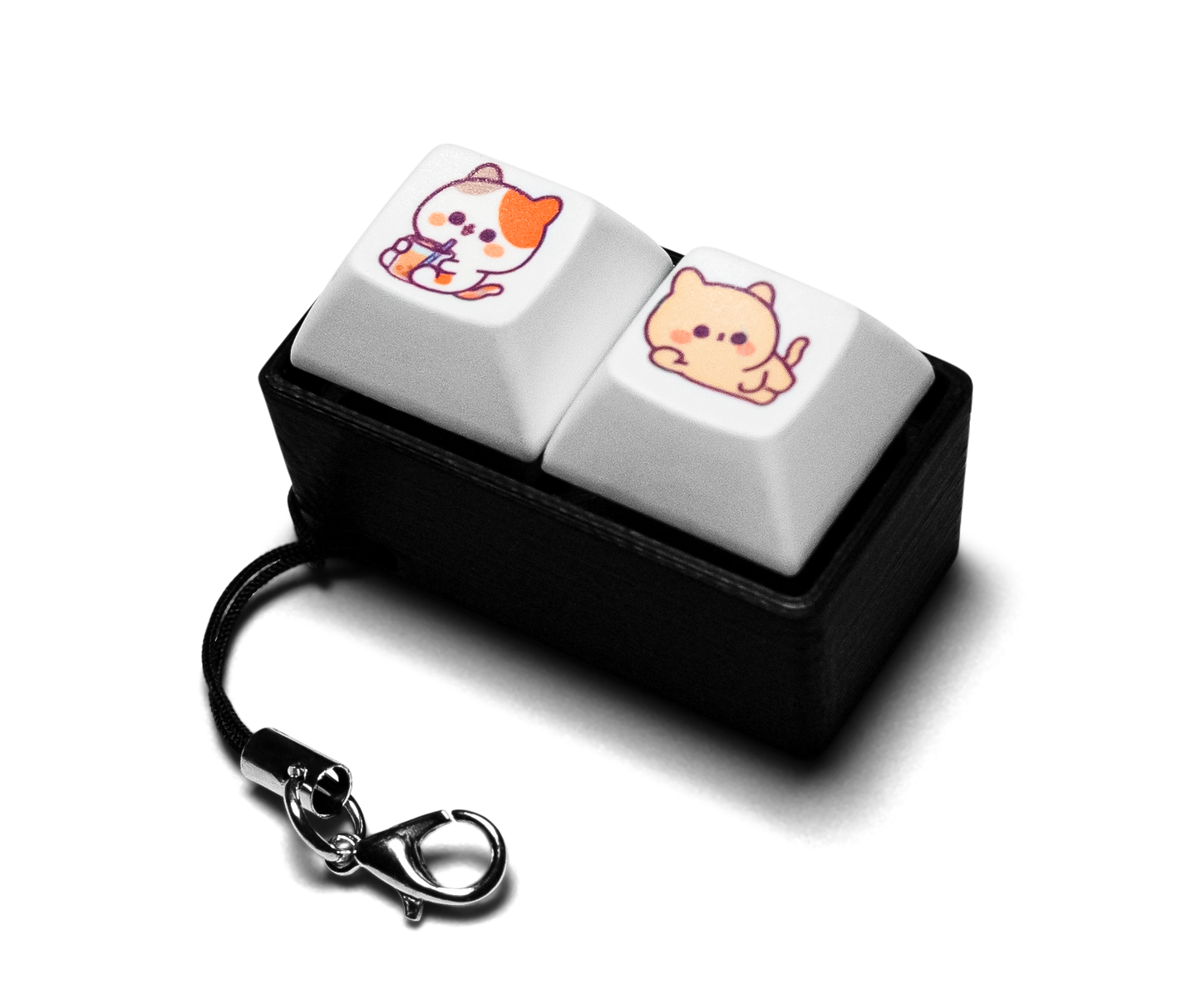 Four-piece keycap fidget with animal-printed white keys, black case, keychain ring