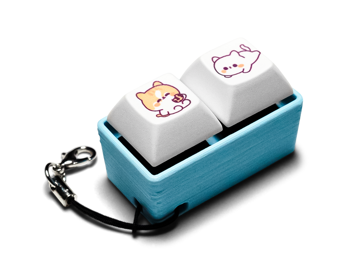 Two-piece keycap fidget with animal-printed white keys, blue case, keychain clip