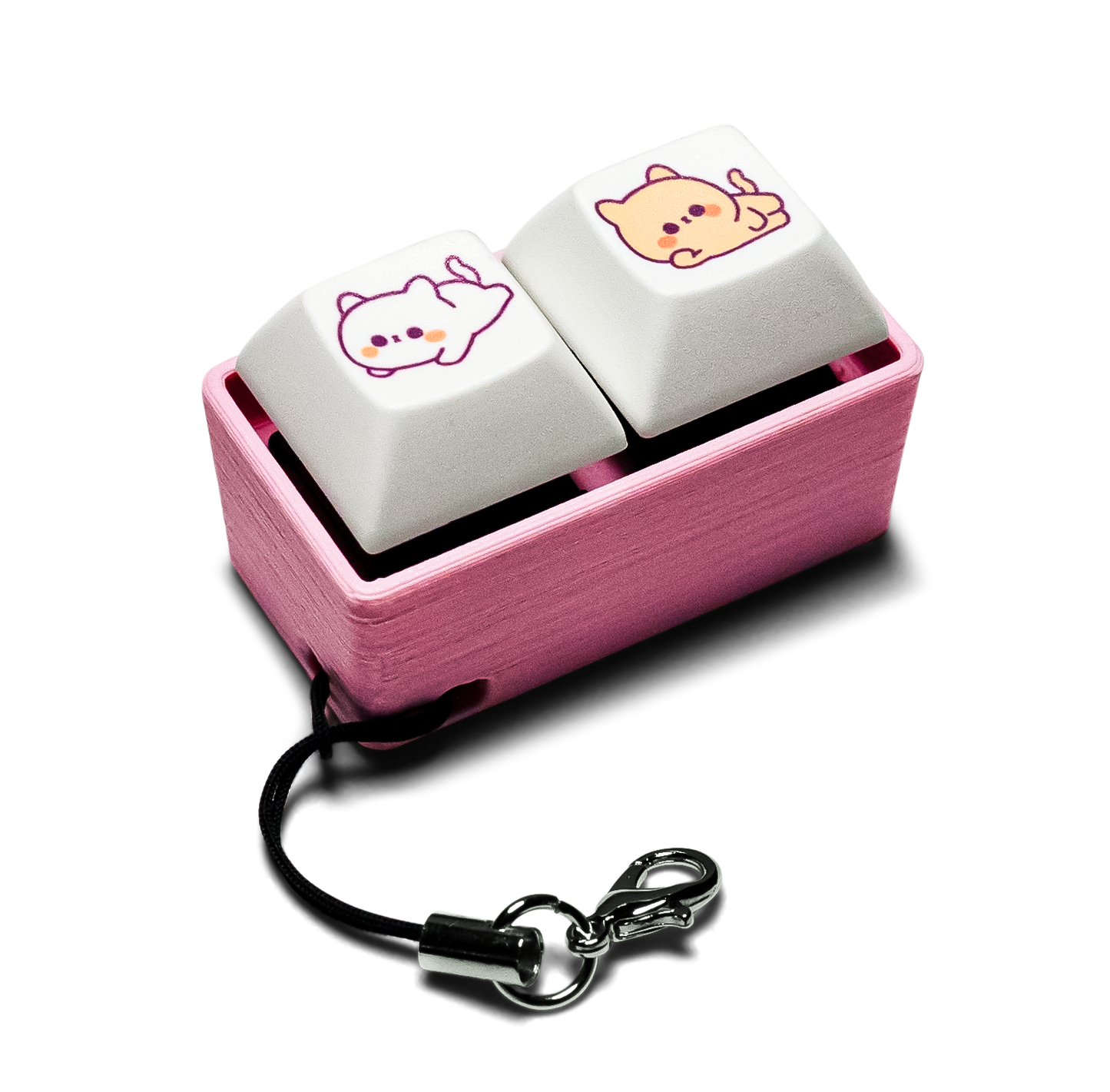 Two-piece keycap fidget with animal-printed white keys, pink case, keychain ring