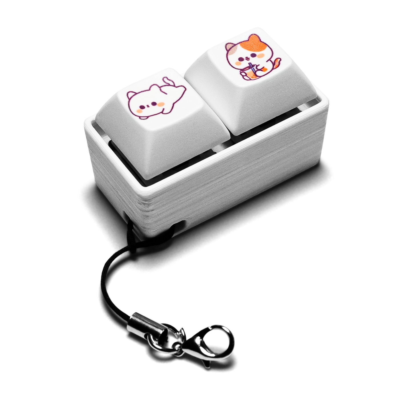 Two-piece keycap fidget with animal-printed white keys, silver case, keychain with ring
