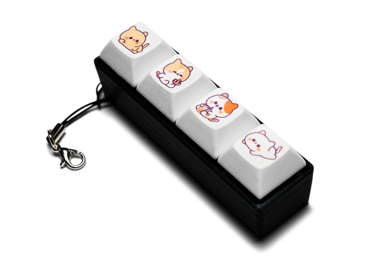 Four-piece keycap fidget with cute animal prints, white keys, black case, keychain clip
