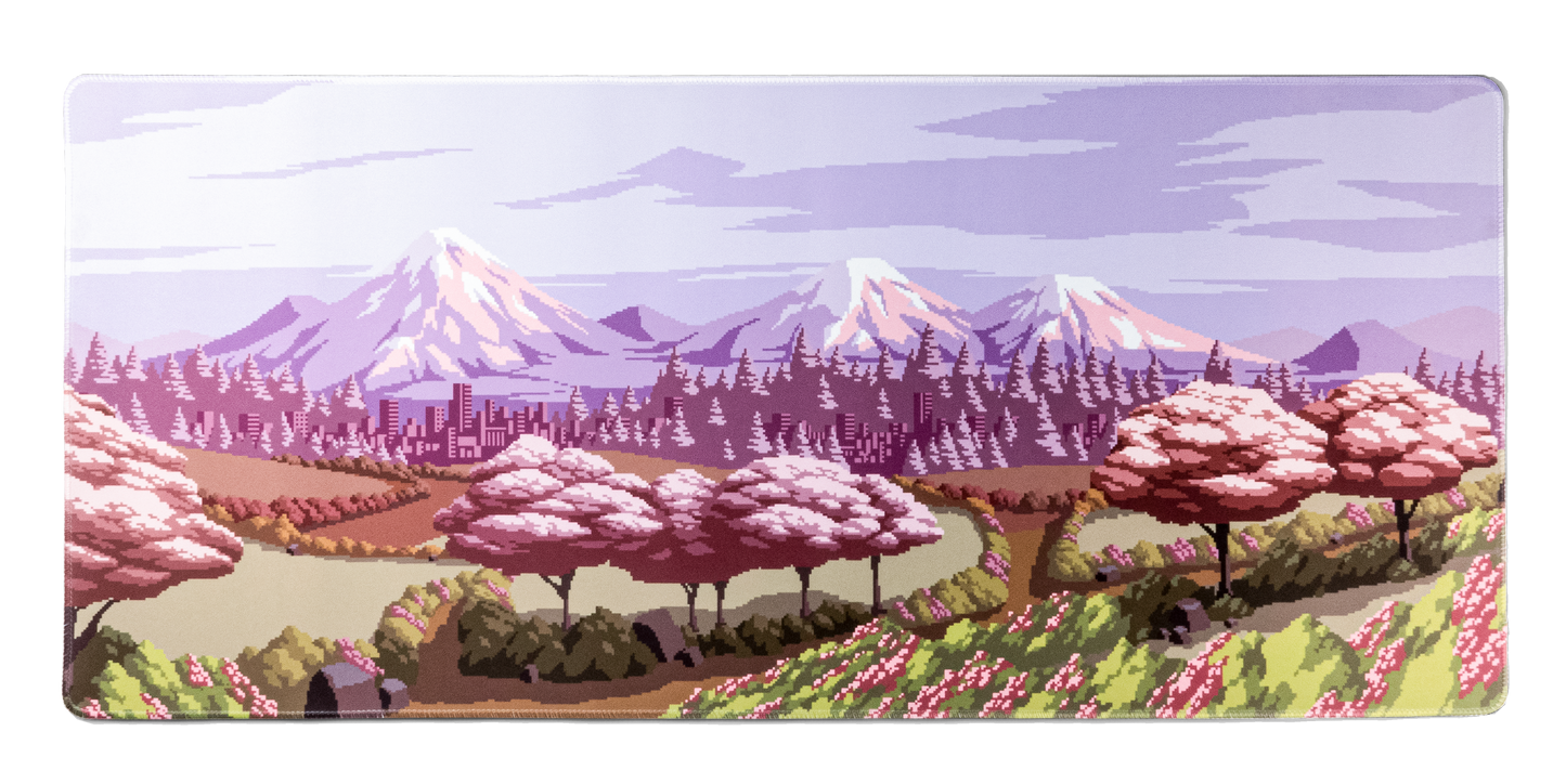 Spring Time desk mat with pixel art mountain landscape and blooming pink trees