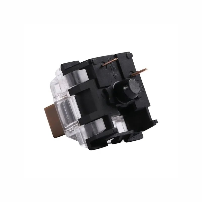 Mechanical keyboard switch underside view with brown stem, black housing, two metal pins