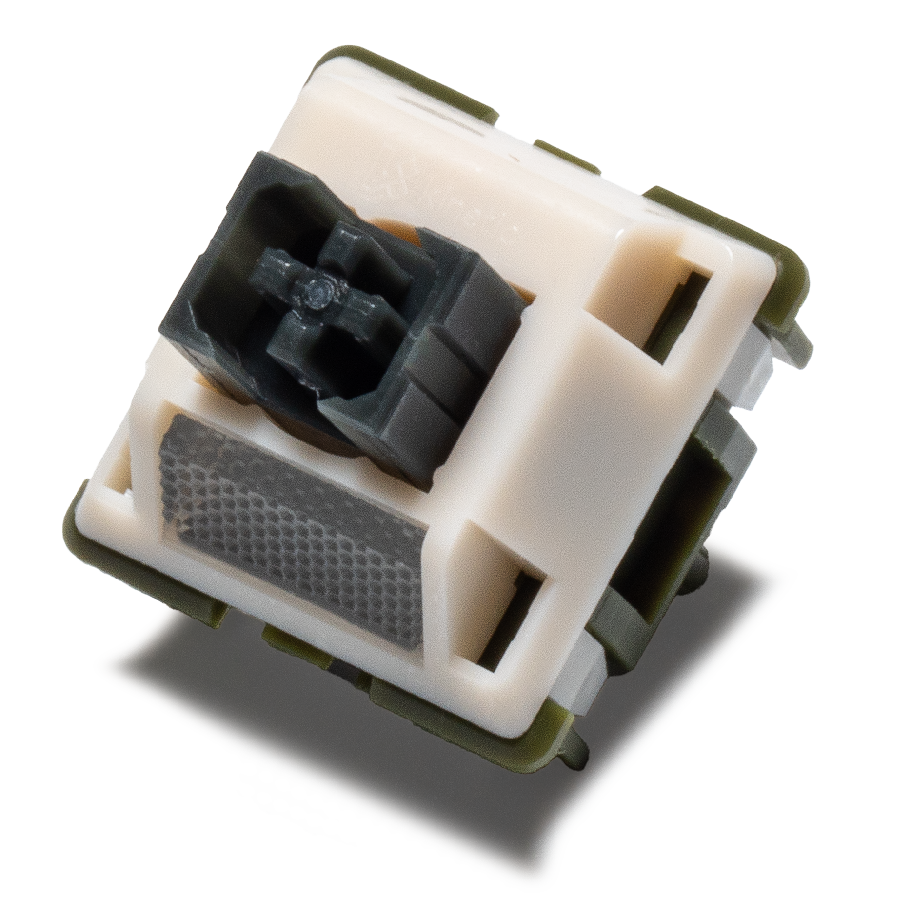 Tactile keyboard switch with cream housing and dark stem, showing the silent contact design