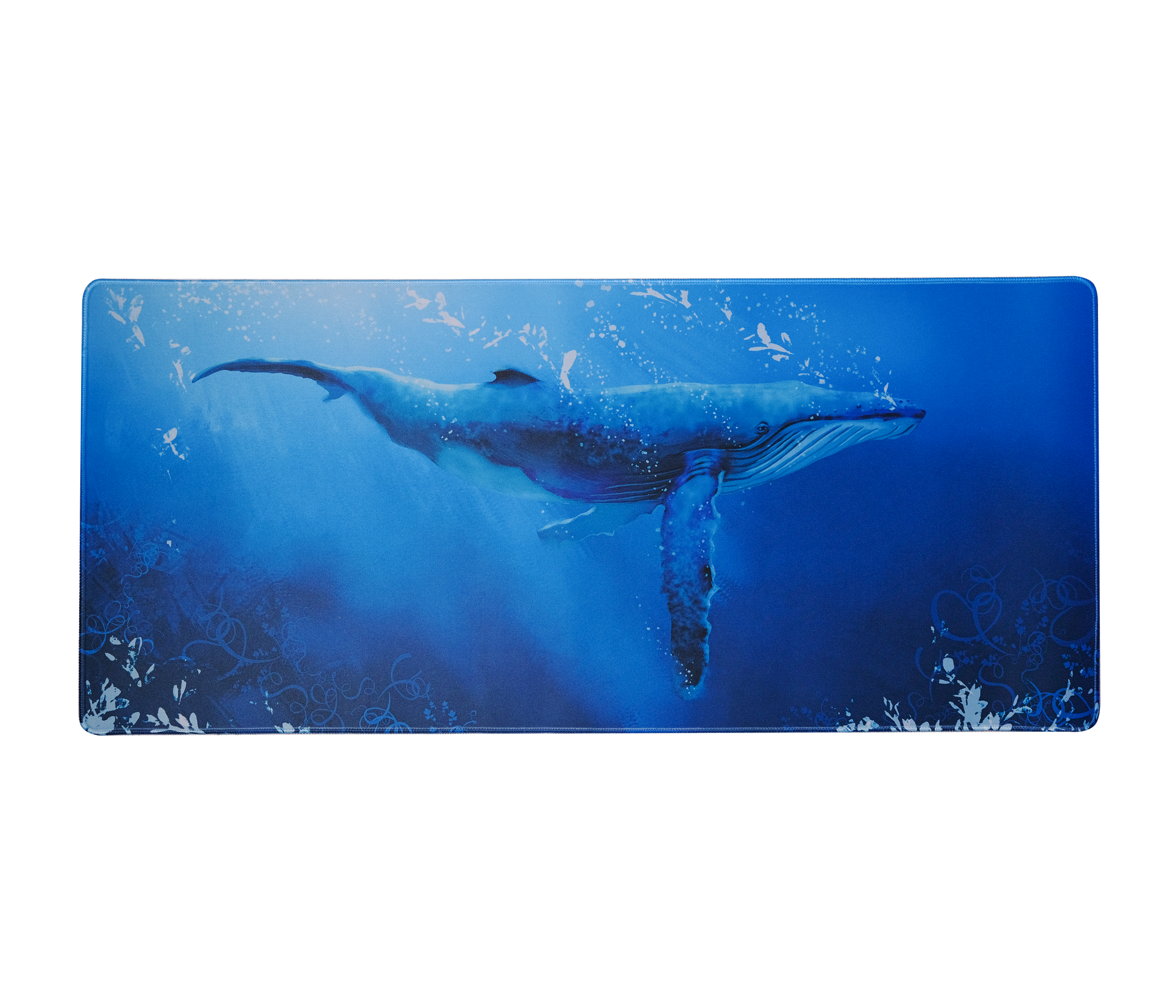 Desk mat with centered blue whale graphic, rounded corners