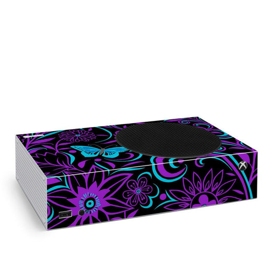 Xbox Series S skin with purple and blue floral graphics, including console cutout area