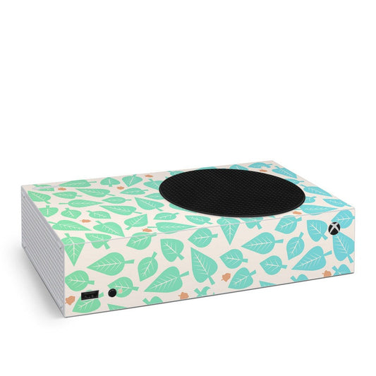 Xbox Series S skin with teal leaf pattern and black top vent cutout.