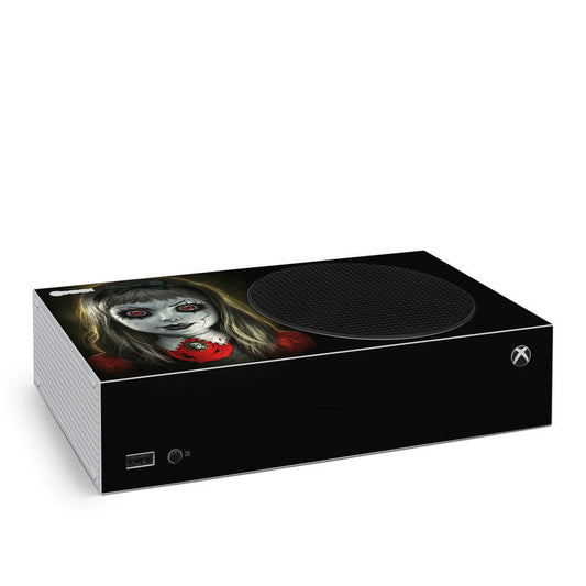 Xbox Series S skin with haunted doll face artwork and red eyes