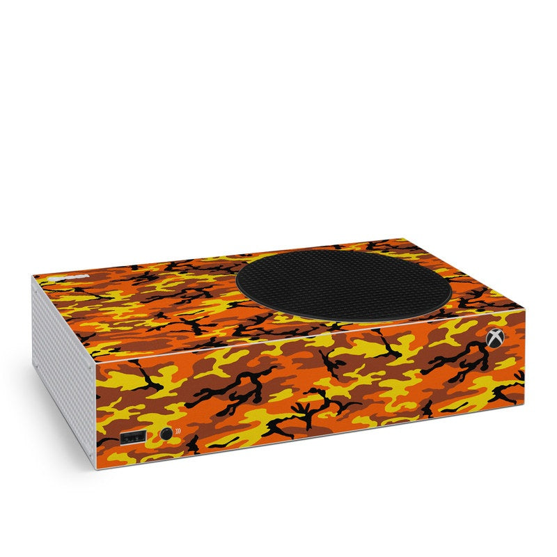 Xbox Series S skin with orange camouflage design and black circular center