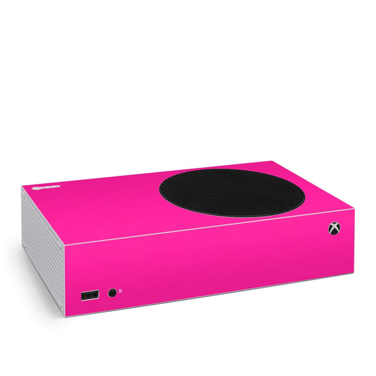 Xbox Series S skin with solid magenta pink finish and black circular top vent