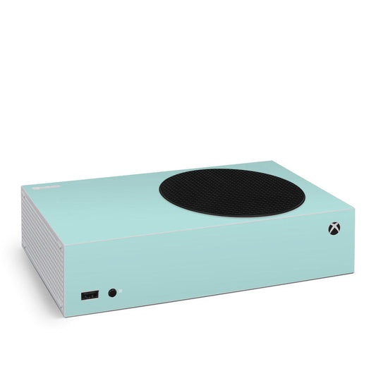Mint Xbox Series S skin with black circular vent and Xbox logo on side