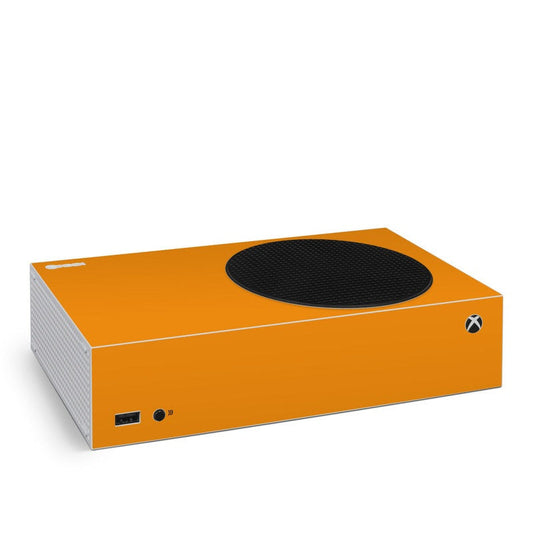 Orange Xbox Series S skin with black circular top and side port cutouts