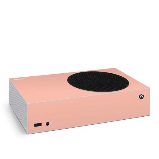 Peach Xbox Series S skin with textured black top grille and Xbox logo