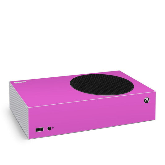 Vibrant pink Xbox Series S skin with circular vent cutout and port icons