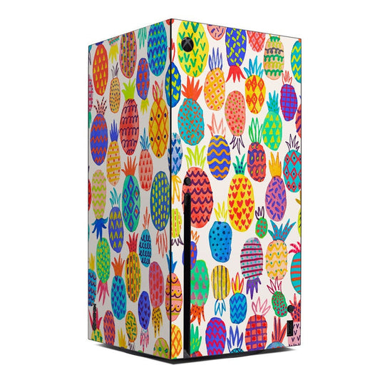 Xbox Series X skin with colorful pineapple pattern in blue, yellow, red, and green
