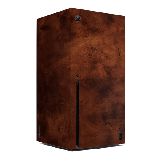 Dark burlwood Xbox Series X skin with wood grain texture and cutouts for ports