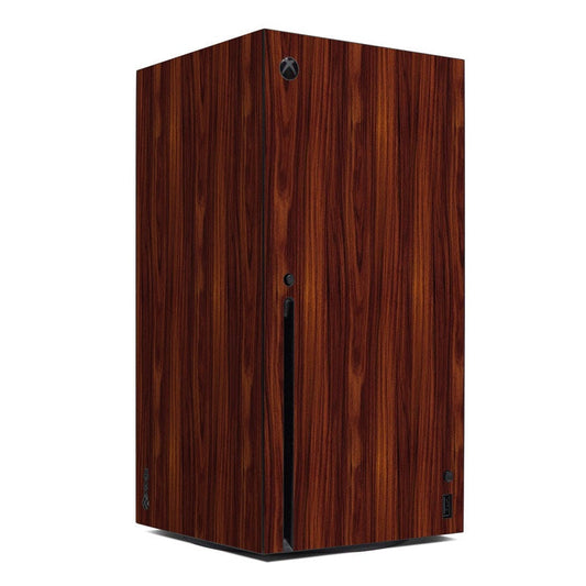 Xbox Series X skin with dark rosewood wood-grain finish, Xbox logo and vent cutouts
