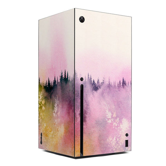 Xbox console skin with pastel purple-pink forest landscape and sunrise gradient
