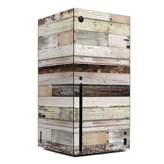 Xbox Series X skin with distressed multicolor wood plank design and Xbox logo cutout