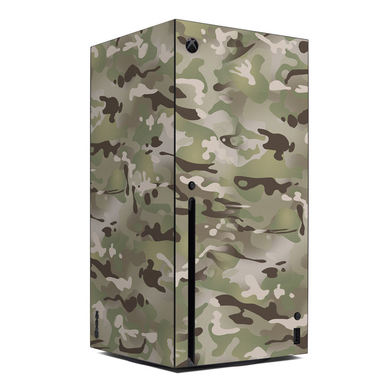 Green camouflage skin for Xbox Series X console, with cutouts and black side accents.