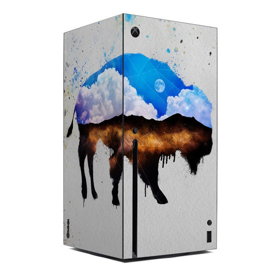 Xbox Series X console skin with blue space sky, planets, and drips over white base