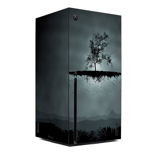 Black Xbox Series X console skin with flying tree silhouette artwork
