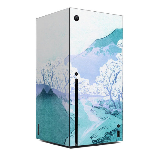 Xbox Series X console skin with blue winter mountain landscape and trees