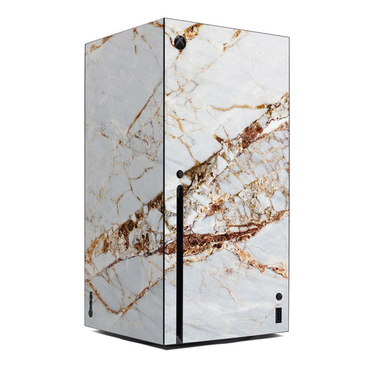 Marble Xbox Series X skin with white and gold veined pattern, side vent cutouts