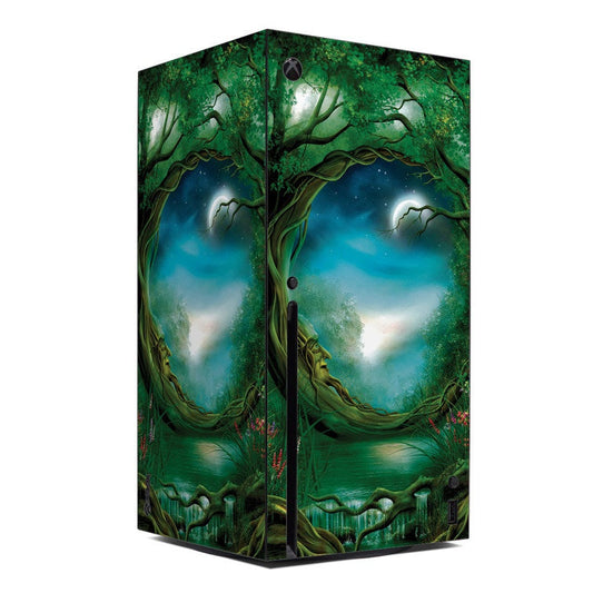 Xbox Series X console skin with green moonlit tree artwork and split-panel design