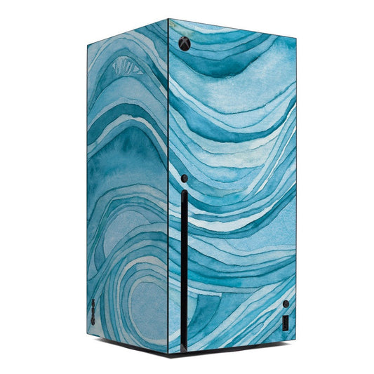 Xbox Series X console skin with ocean blue wavy marble design and cutout holes