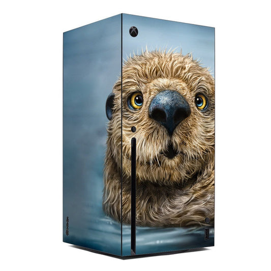 Xbox Series X console skin with otter totem animal face graphic, blue and tan.