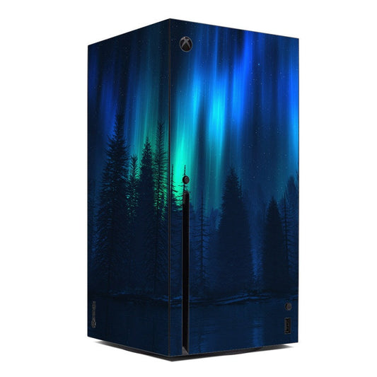 Xbox Series X console skin with blue aurora sky and pine tree silhouettes