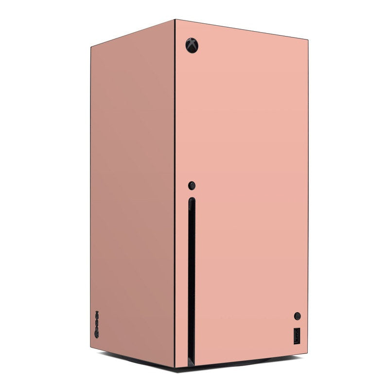 Microsoft Xbox Series X skin, solid peach pink with black port cutouts and buttons
