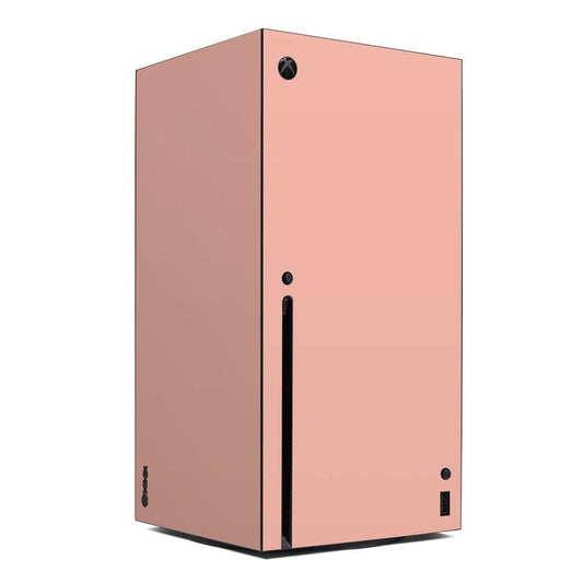 Microsoft Xbox Series X skin, solid peach pink with black port cutouts and buttons
