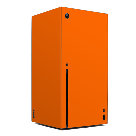 Orange Xbox Series X console skin with black vent and power port cutouts