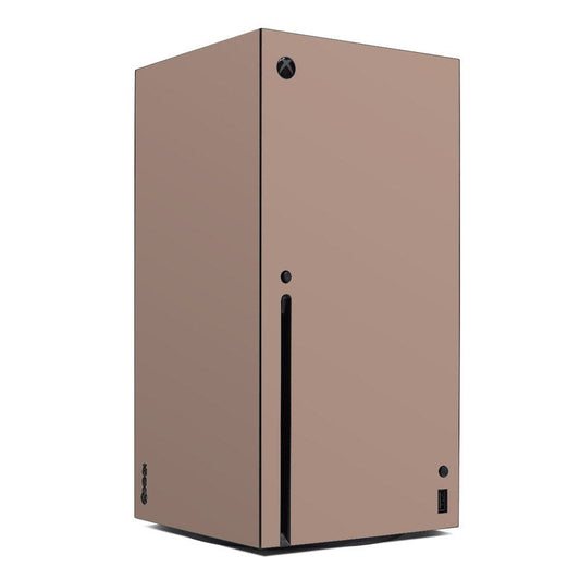 Xbox Series X console skin, rustic pink with black port cutouts and Xbox logo