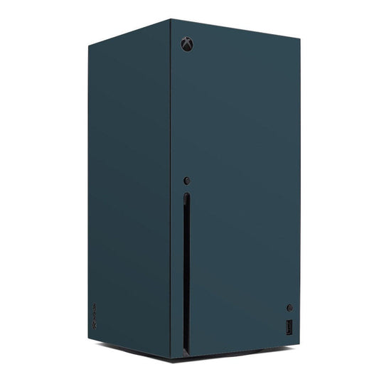 Xbox Series X console skin with dark teal finish and centered Xbox logo and port cutout.