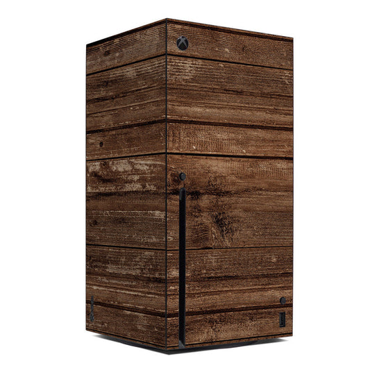 Wood-grain Xbox Series X console skin with striped plank pattern and Xbox logo cutouts