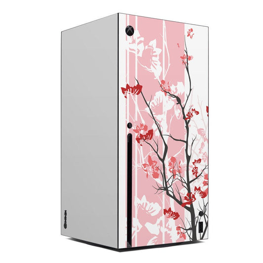 Xbox Series X skin with pink and red blossom tree branch graphics on pale base
