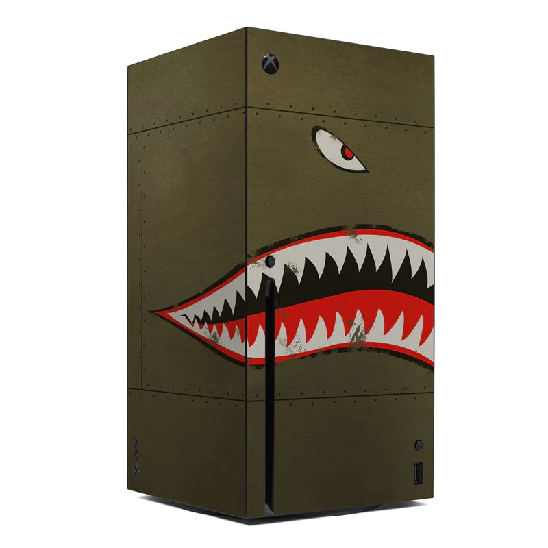 Xbox Series X console skin with green camouflage and shark mouth graphic, Xbox logo on top