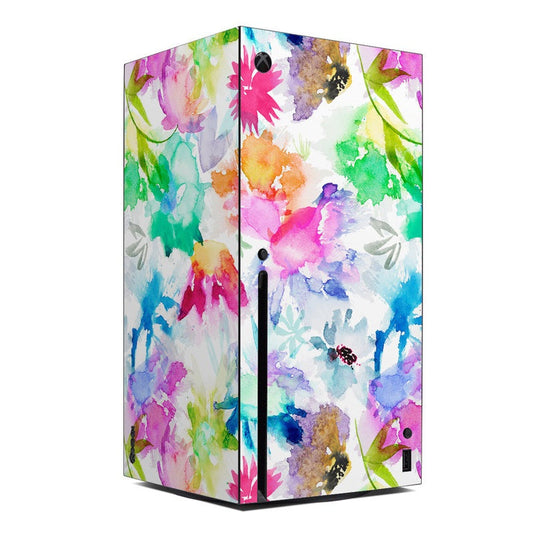 Watercolor floral Xbox Series X console skin wrap with bright pink, green, and purple artwork
