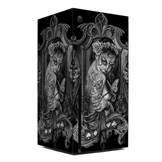 Xbox Series X console skin with black gothic girl-and-skull artwork and ornate filigree