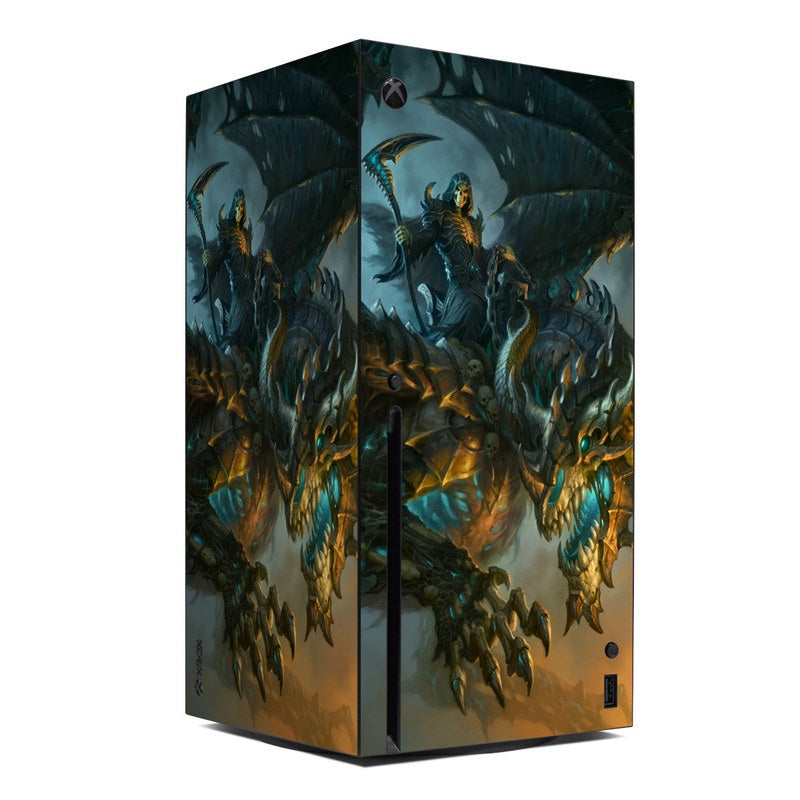 Xbox Series X console skin with teal and gold dragon wing artwork on dark background