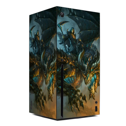 Xbox Series X console skin with teal and gold dragon wing artwork on dark background