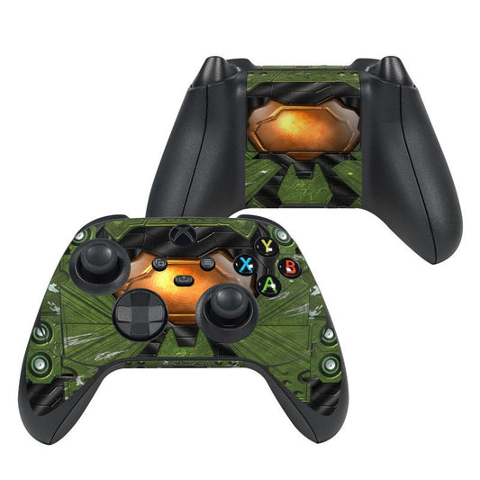 Xbox controller skin with green camouflage and orange button art, black grips