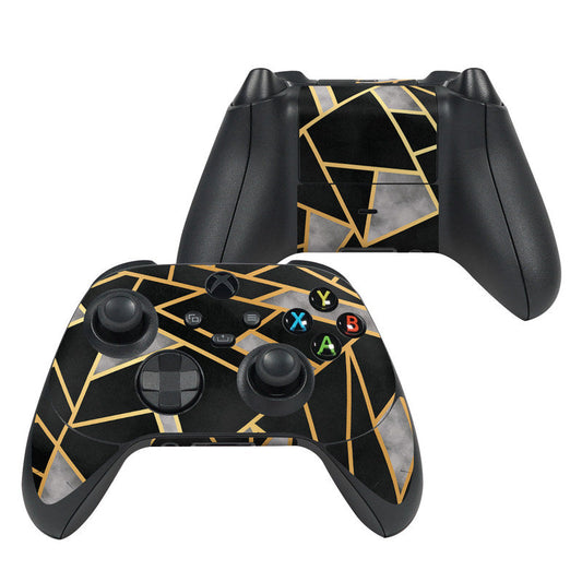Xbox Series X controller skin with black base, gold geometric lines, gray accents