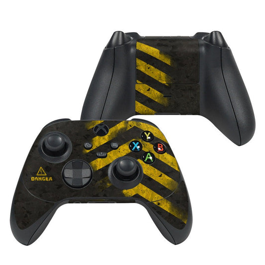 Xbox controller skin with black and yellow hazard stripe pattern